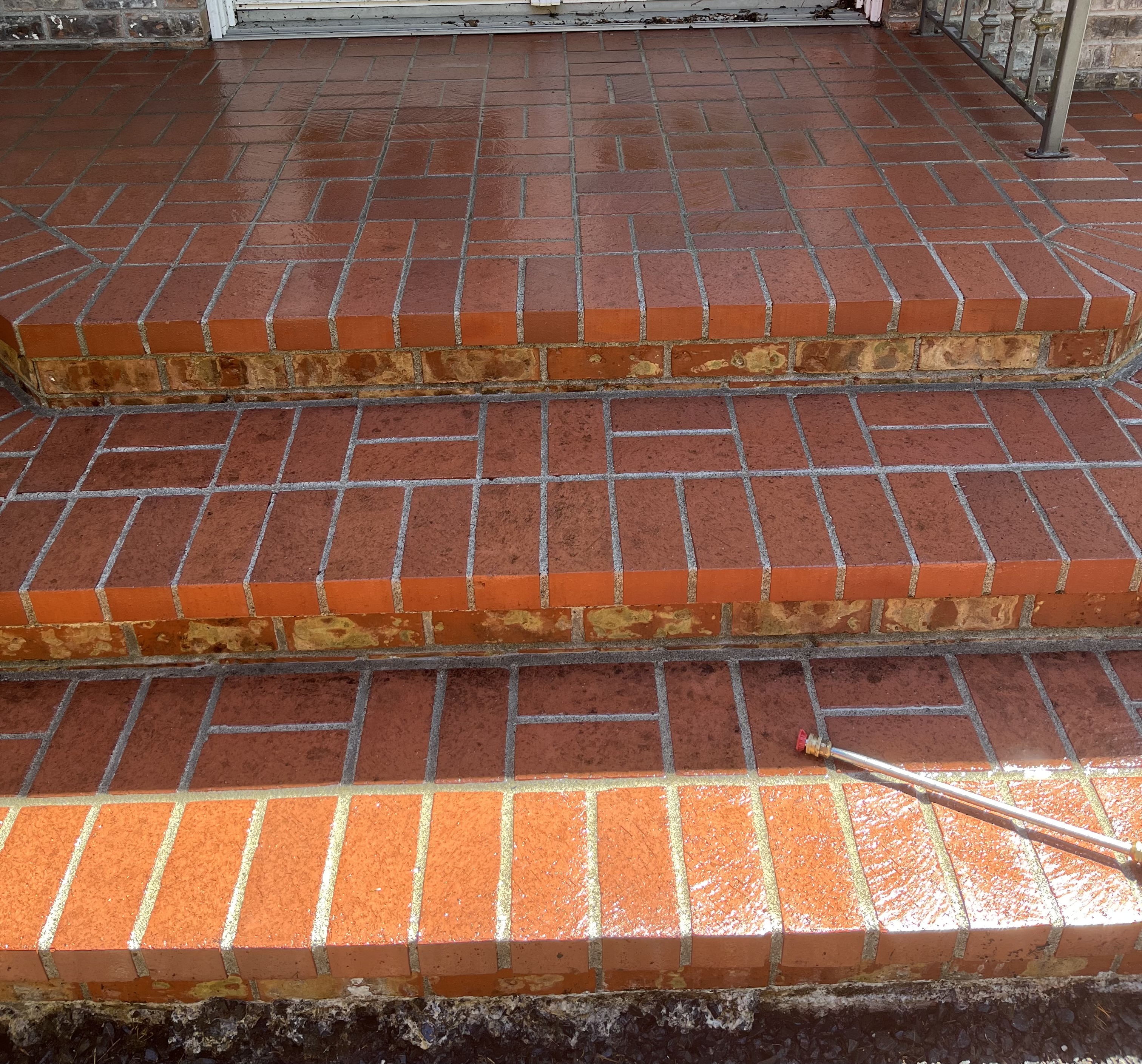 Clean steps made of red brick.