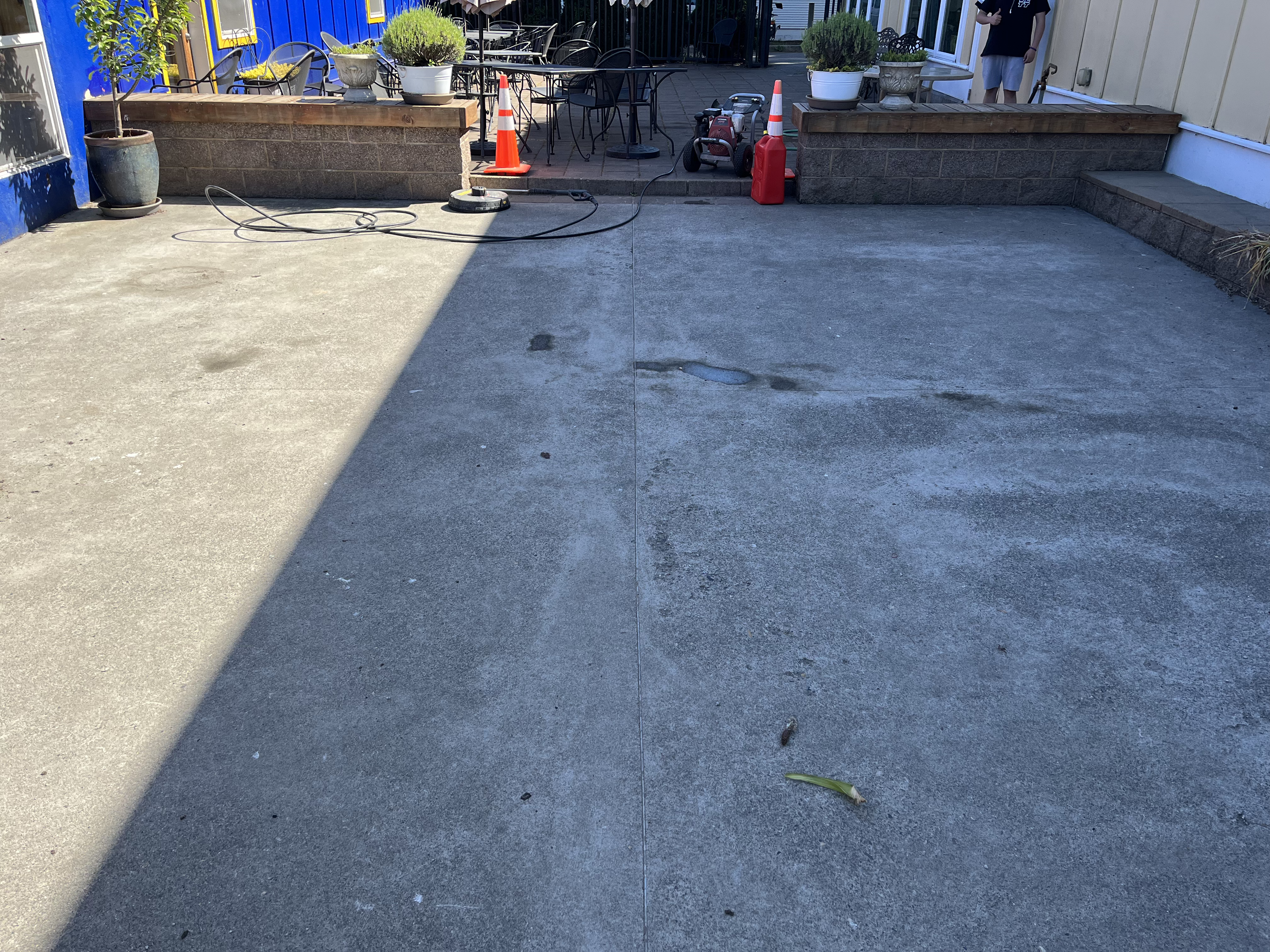 Dirty cement side of house.